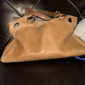 Classic Cartier well loved camel colored purse